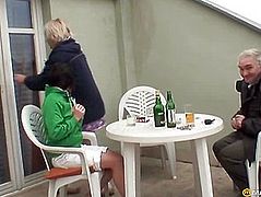 Young girl drink with a couple of family
