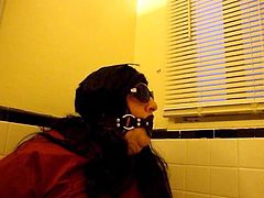 Me bound and gagged in the bathroom