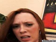 Redhead spends time masturbating