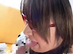 This Japanese nerd gives amazing blowjobs and she looks really sexy doing it, in her glasses and maid cosplay uniform. The hottie deepthroats his cock and licks his balls. She wants to see him orgasm hard.