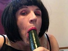 Shayna Slurping on Cucumber