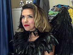 Pornstar in angel wings gets her makeup done