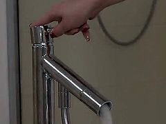 Subil Arch is alone in the bathroom. While getting cleaned up, she brushes her pussy with the shower head. The stream of water gets her off so she starts masturbating. Brunette.