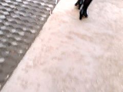 Lady in opaque pantyhose walking