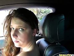 Brunette fucks in a car