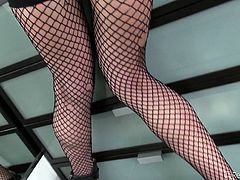 Jayden looks very provocative, wearing kinky fishnet stockings. This bitch has wonderful boobs, which she does not hesitate to show off. Click to watch her on knees, sucking Rocco's appetizing dick! Her buttocks also offer such an inciting view... See more and have fun.