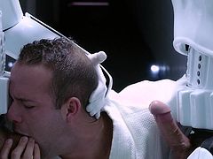 Looks like a nice parody of a movie made a long time ago, in a galaxy far, far away and over the rainbow at that. The prisoner gets in the good graces of at least two of his captors, by getting on his knees and sucking some Storm Trooper cock.