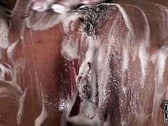 Cherry Jul with small tities and clean muff howls as she dildos her pussy