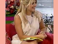 HOLLY WILLOUGHBY FLASHING SOME THIGH