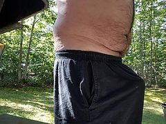 Jerking off outdoors in back yard cum shot public