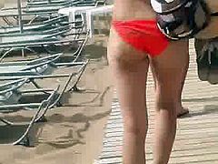 red bikini babe slut wife walking at the beach hot ass