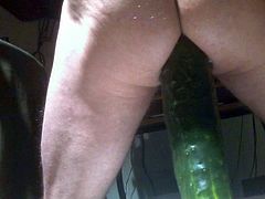 riding a huge cucumber