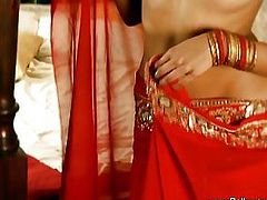 A daring Indian Lady dancing with a seductive way of showing