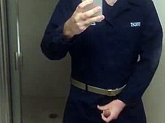 Jack off in US Navy coveralls
