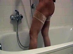 mature in shower showing off hairy pussy