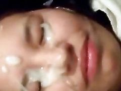 Chubby sweet Asian babe getting a massive facial in closeup