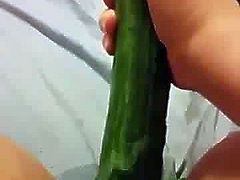 Peeing a huge load while inserting a cucumber 1