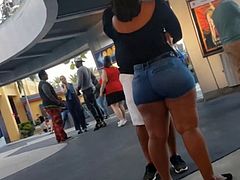 Big bubble butt brunette in tight jean shorts