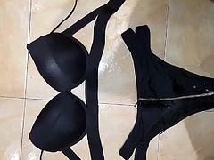 Pissing over sexy black panty and bra combo