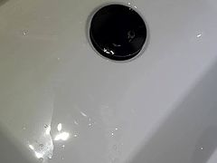 Pissing in a sink