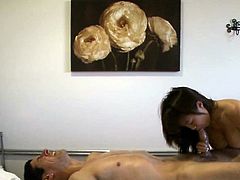Asian masseuse tribbing on a clients dick