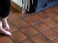 Sister in law barefoot in the kitchen