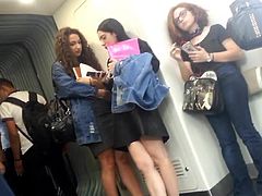 2 girls candid in metro