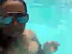 Sexy girl doing selfies in a pool.mp40