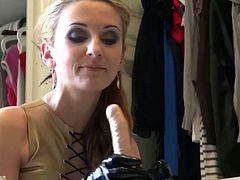 Delicious blonde in latex plays with a rubber cock
