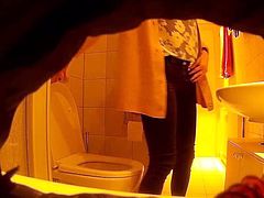 Spying cute blonde on the toilet, hidden cam