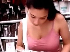 Depraved gets his dick in a store next to a woman
