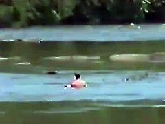 Couple Having Sex in a river