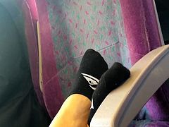 Candid, Restless Feet on the Train