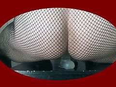 fishnet and dildo  on the chair