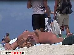 Amazing nudist  hotties bathing in sun at the beach