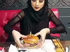 Sexy hijabi eating big BURGER