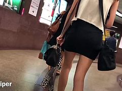 Upskirt - sexy G-string cover by tight skirt at mrt