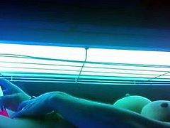 Shelly Lee masturbating while tanning