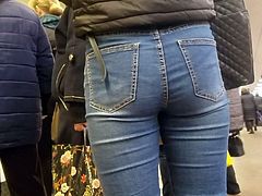 Girl's ass in tight jeans
