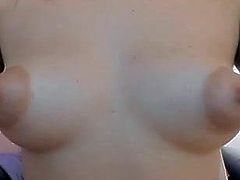 Horny teen with small pert tits and big puffy nipples
