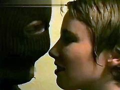 Vampire chick rides a masked guy