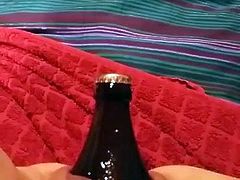 Big Beer Bottle in pussy