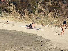 asian nude playing at baker beach 1