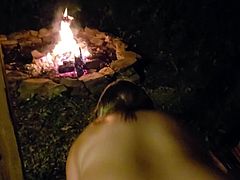 Wife sucks and fucks next to a bonfire while camping