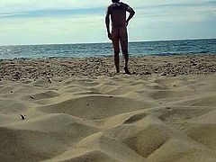 Naked nudist man at nude beach