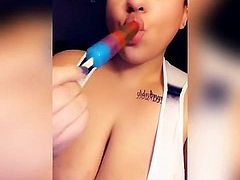 Sexy BBW latina sucking on a popsicle.