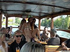 Ginger slave fucked on a crowded boat