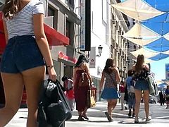 Beautiful asses of shorts parading on the street of Spain