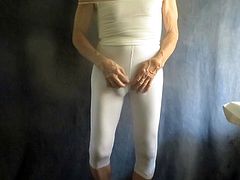 Sissy bitch in tight white spandex shakes his fem ass.