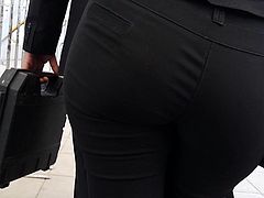 Milf in tight pants waiting bus